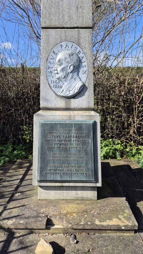 The monument to Steve Fairbairn, founder of the Head of the River Race in 1926. The monument doubles as the Mile Post on the Boat Race course, and marks one mile to finish for crews contesting the Head of the River Race. 